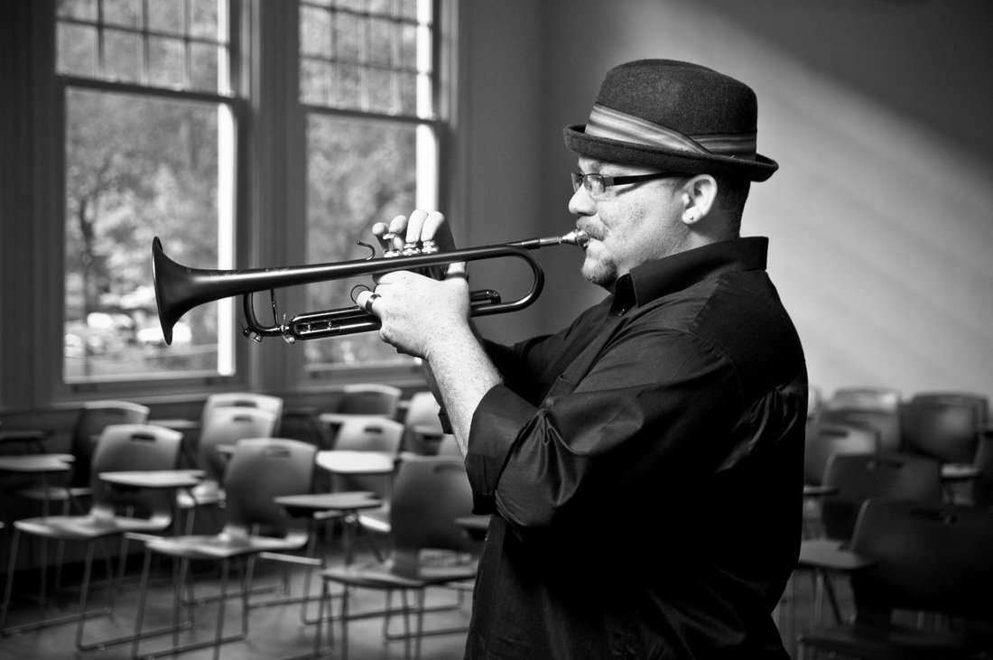 Farnell Newton playing trumpet